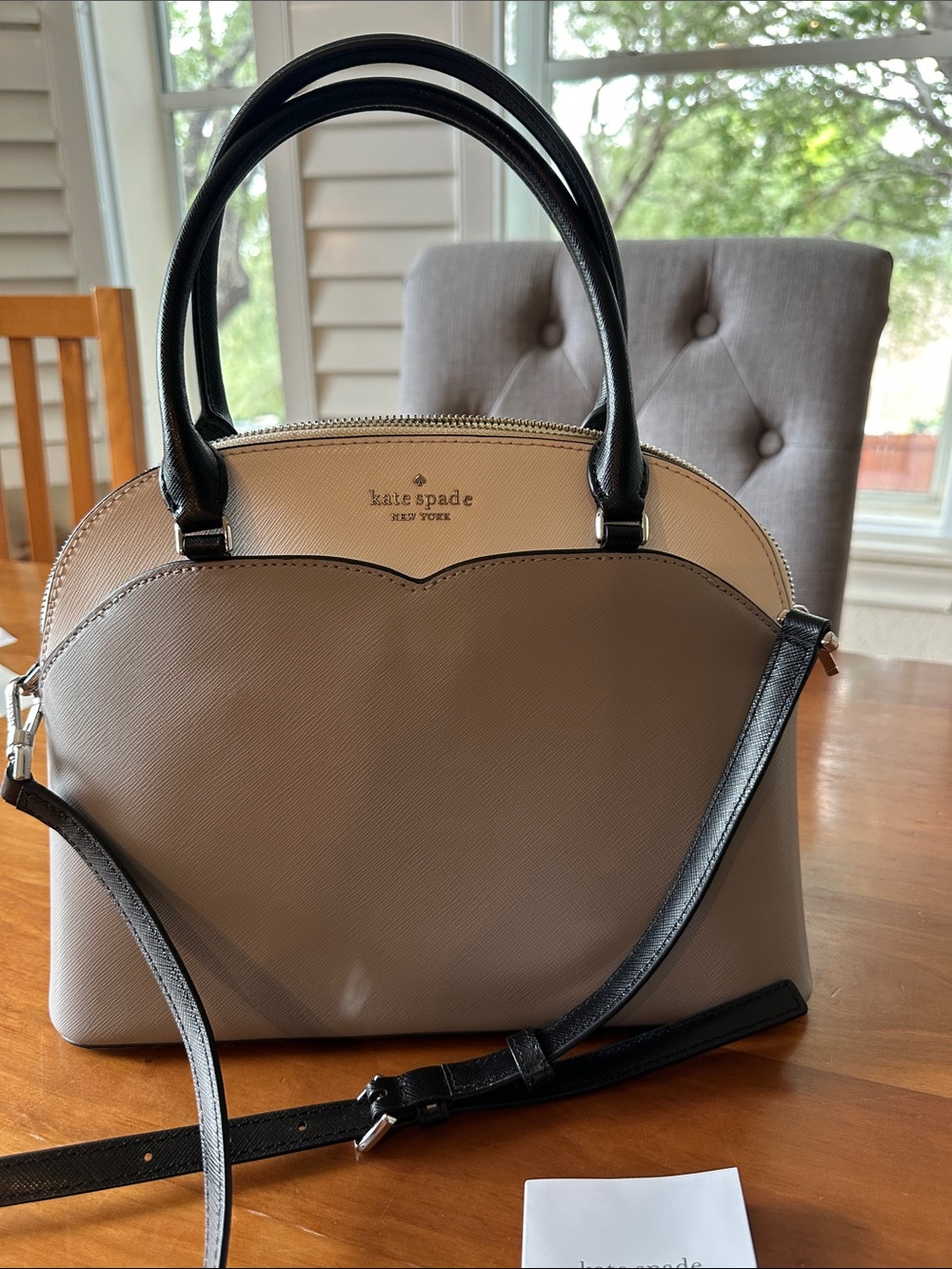 kate spade two-tone beige and black dome satchel with crossbody strap